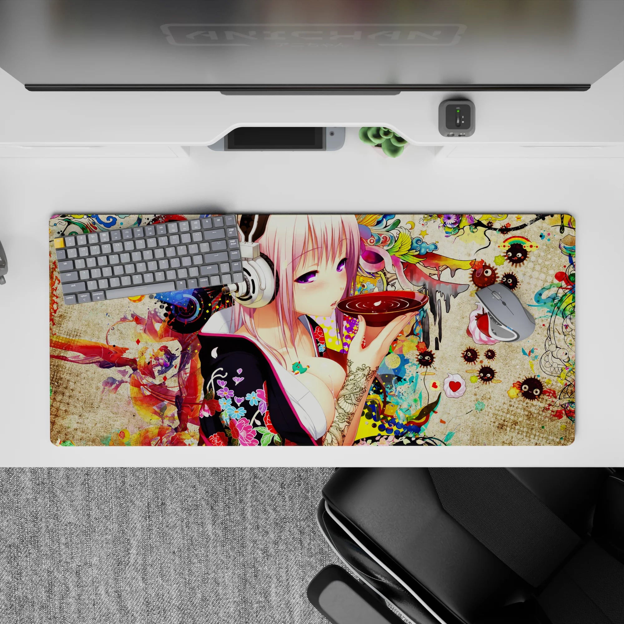 36x16 inches anime desk pad in neon pinks and reds with soot sprites, candy florals, late-night otaku vibe.