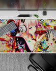 Pink neon anime desk pad 40x20 inches, late-night cozy vibe with reds, candy florals, textured backdrop.
