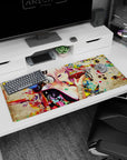36x16 inches desk pad showing pink-haired anime girl in big silver headphones sipping from a glossy red bowl.