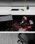 Dark charcoal anime desk pad 36x16 inches with red light streaks, smoky rocks, fast sci-fi vibe.