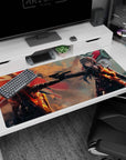 Anime girl desk pad 40x20 inches showing two fierce girls facing off over a pistol, red flags behind.