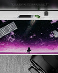 40x20 inches anime desk pad in violet clouds and soft pink glow, dreamy starry night mood.