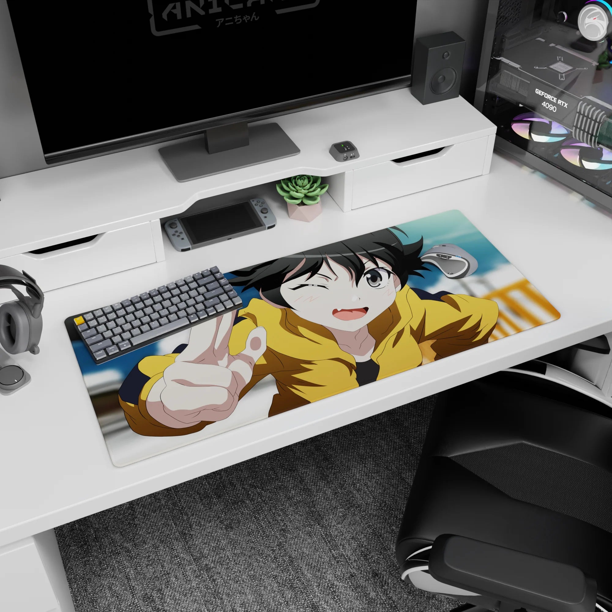 Winking anime girl in yellow hoodie flashing a peace sign on a 36x16 inches desk pad.