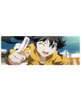 32x12 inches anime girl mouse pad with winking girl in mustard hoodie, peace sign, crisp bold line art.