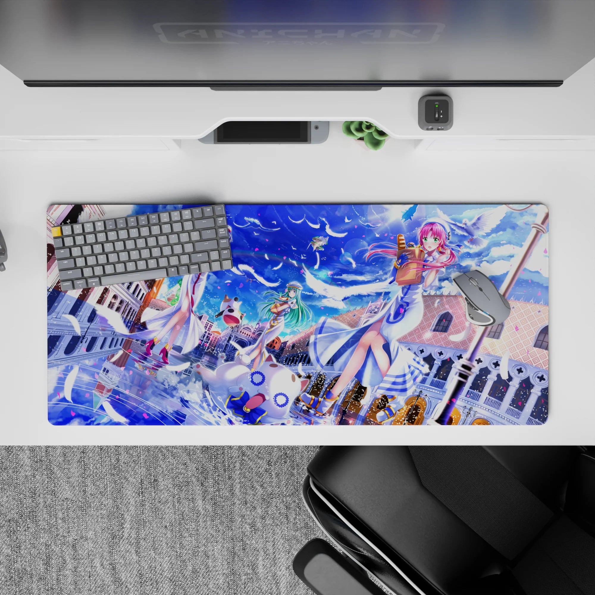 Bright sapphire blue 36x16 inches anime girl desk pad with white feathers and pink petals, cozy feel.