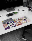 32x12 inches anime mouse pad showing winking and smirking maid catgirls serving sweets at tea time.