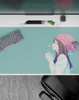 Pastel teal anime desk pad 40x20 inches, soft winter comfort vibe with gentle blush accents and calm feel.