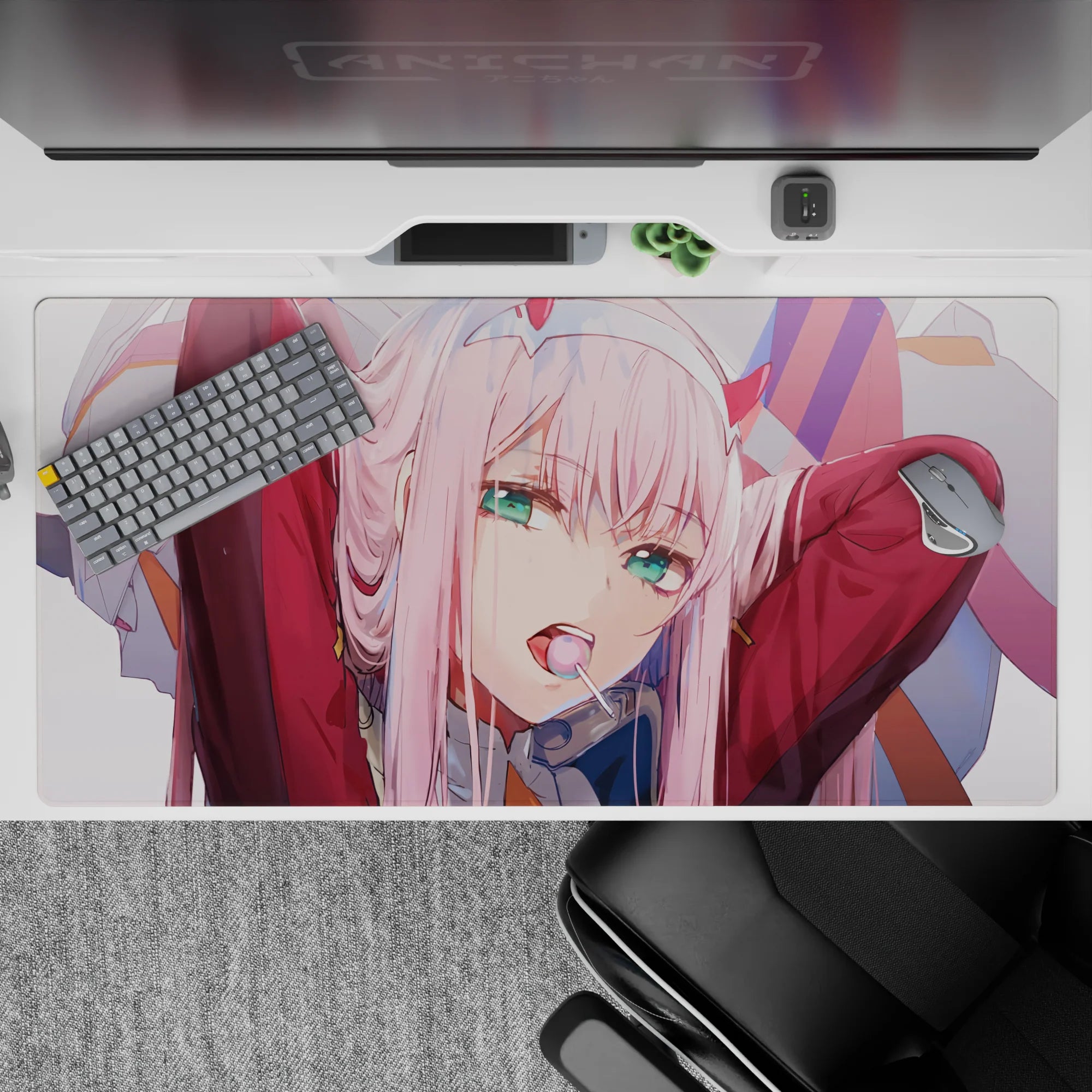 40x20 inches desk pad with Zero Two from Darling in the Franxx, capturing her bold spirit with a lollipop and intense look in her eyes.