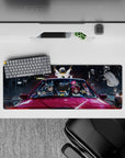 Anime girl mouse pad 32x12 inches in blue, magenta, and gold neon glow with late-night arcade mood.