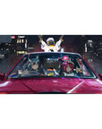 Anime girl desk pad 40x20 inches with mischievous duo in glossy red car, neon city street racer art.