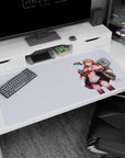 Smiling glasses anime girl posing with a tiny hovering UFO on a 40x20 inches desk pad.