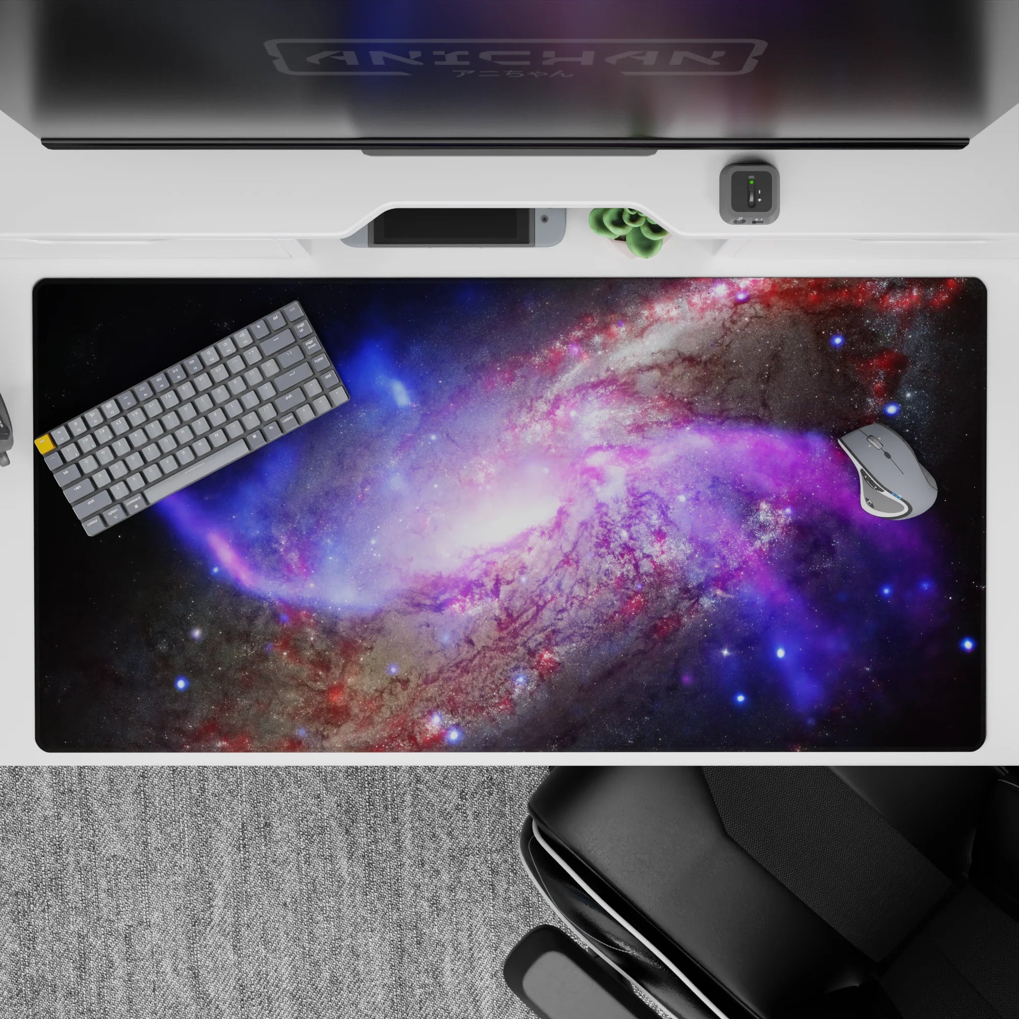 Dreamy cosmic desk pad 40x20 inches in electric blues and juicy purples over deep charcoal space.