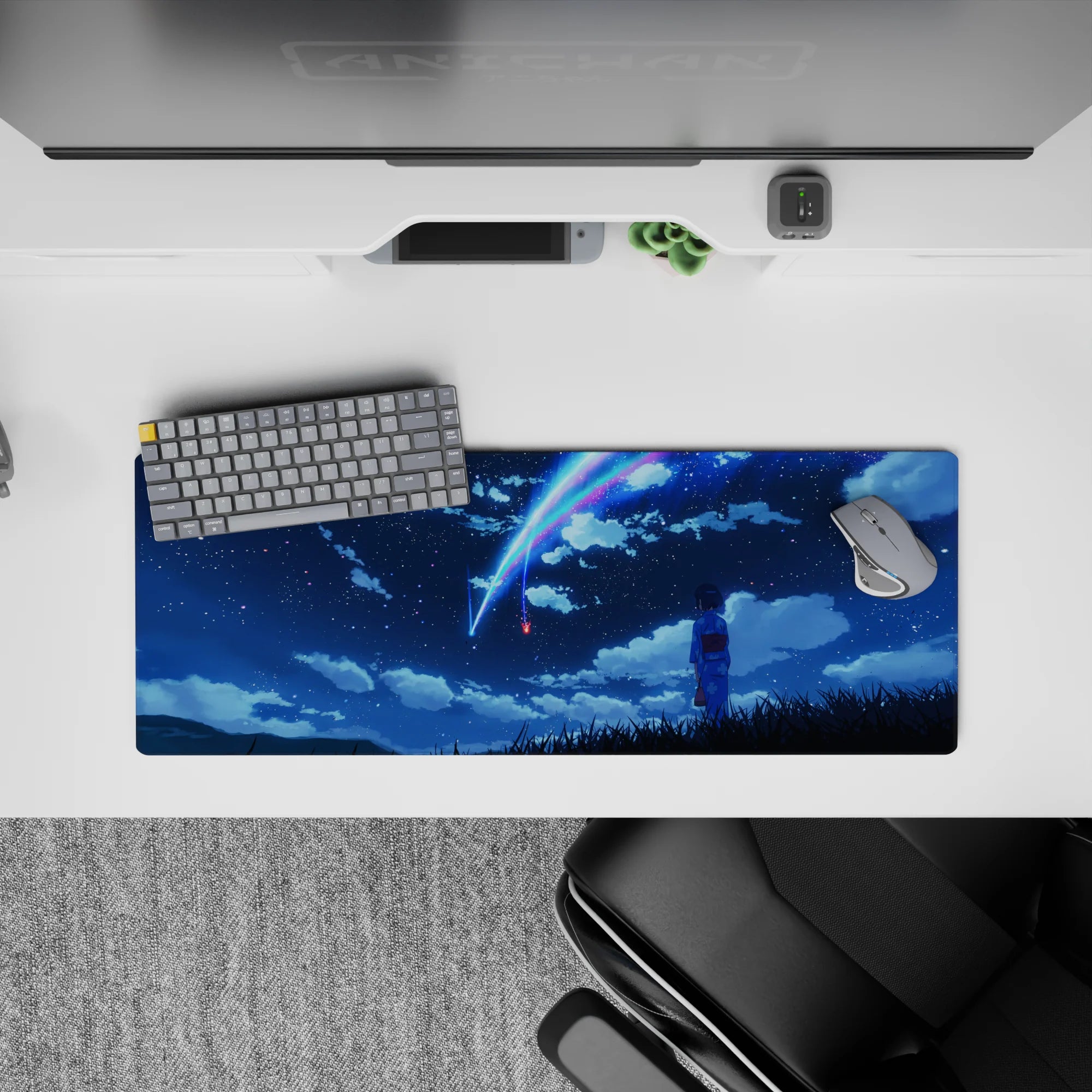32x12 inches anime mouse pad in deep navy, neon blue and pink comet trails, calm electric vibe.