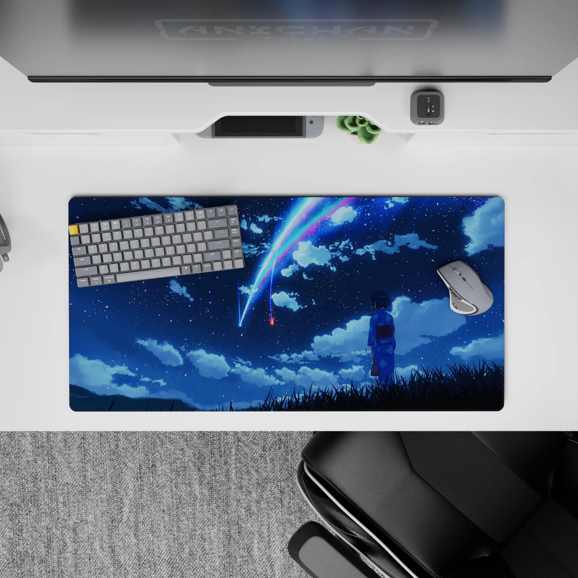32x16 inches anime mouse pad in deep navy, neon blue and pink comet trails, calm dreamy vibe.