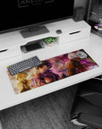 32x12 inches anime mouse pad of wide-eyed explorer holding a tiny creature as blonde partner looks on.