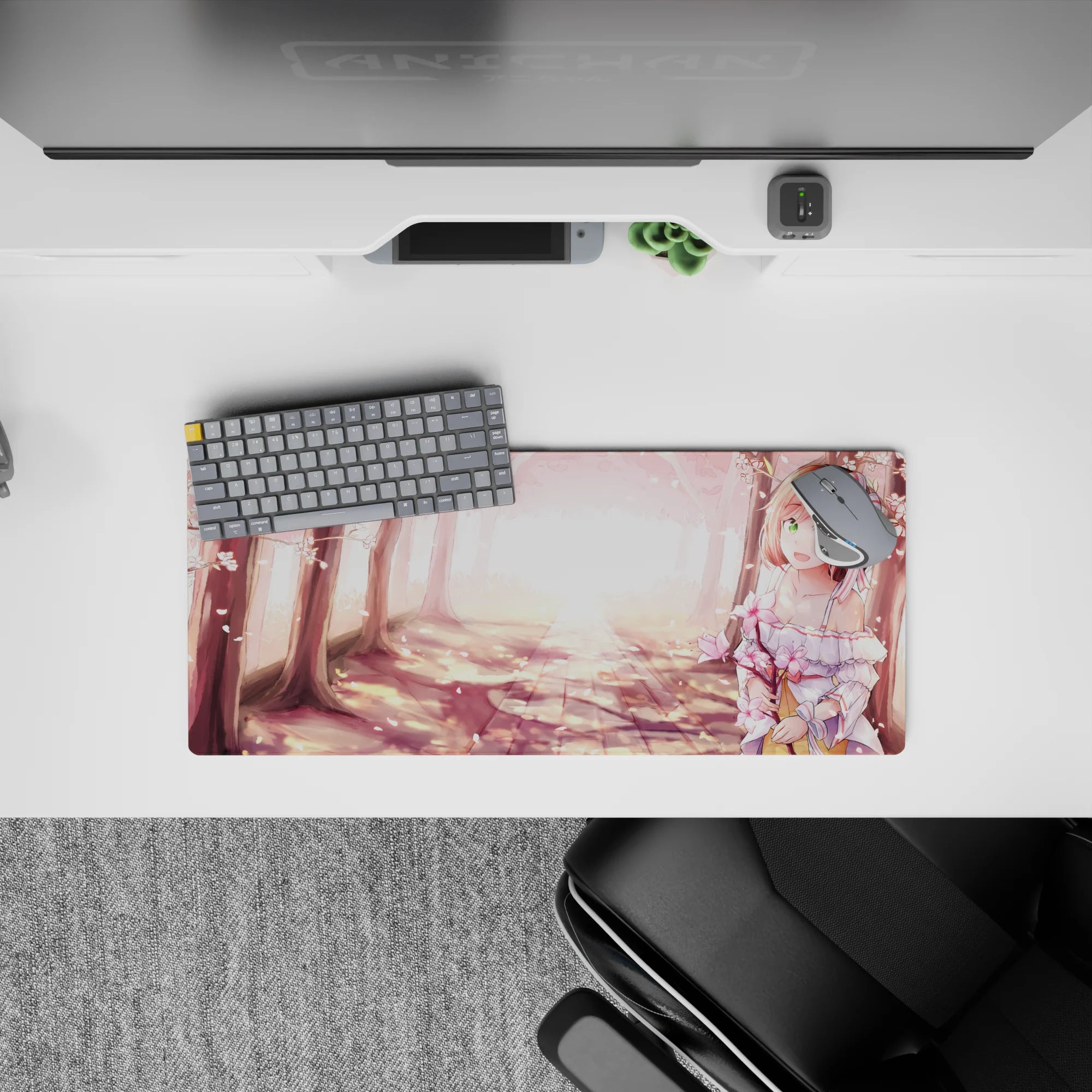 28x12 inches anime girl mouse pad in blush pink petals and warm golden glow, soft spring vibe.