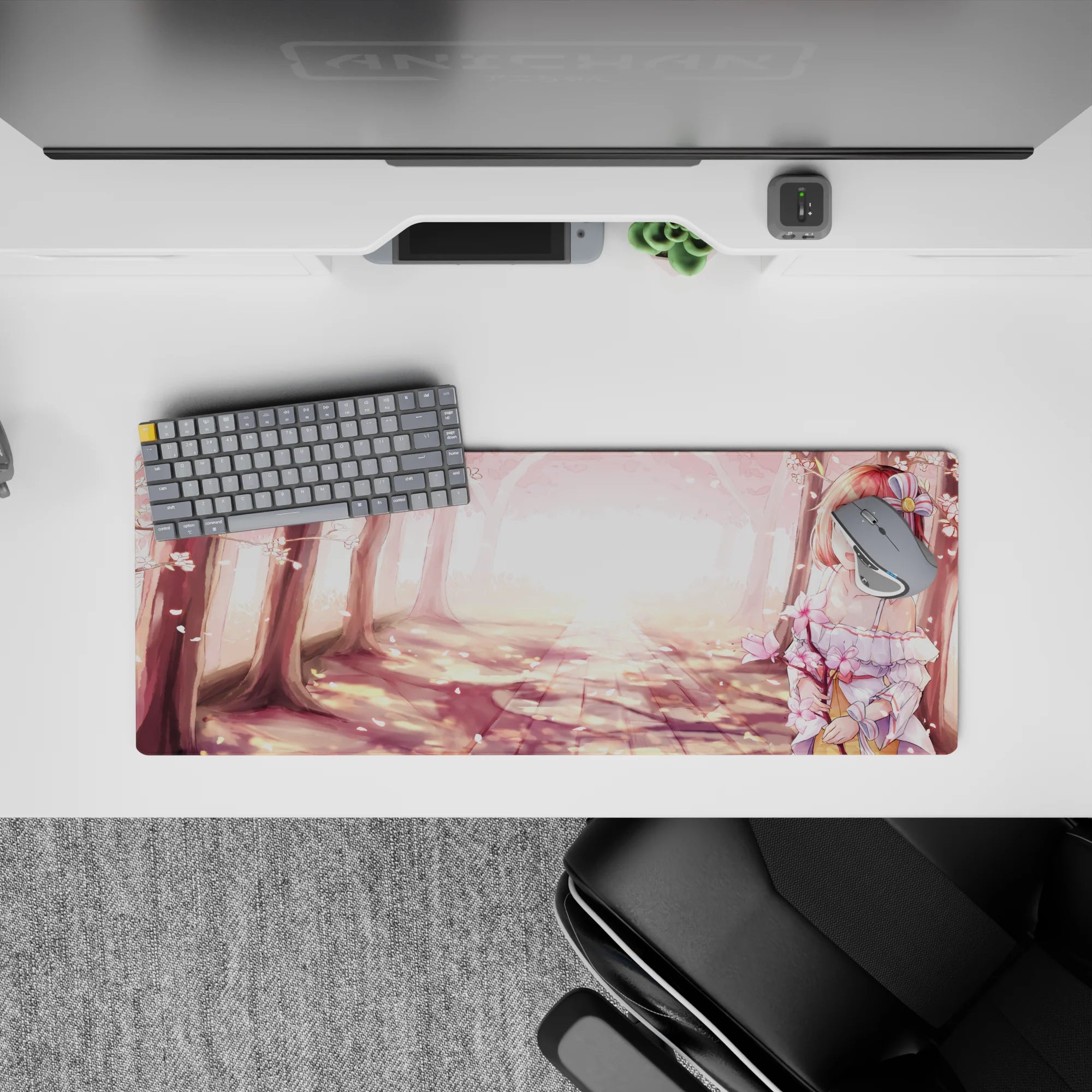 32x12 inches anime girl mouse pad in blush pink sakura petals and warm golden spring glow.
