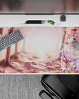 Cherry blossom anime desk pad 40x20 inches in blush pink petals and warm golden spring glow.