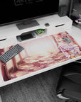 40x20 inches anime girl desk pad showing a sweet pink-haired girl holding blossoms on a dreamy path.