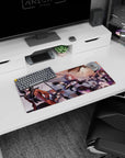 28x12 inches anime girl mouse pad showing sharp-eyed girls aiming pistols as money flutters around.