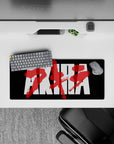 Cyberpunk black mouse pad 28x12 inches with high-contrast white blocks and raw crimson paint vibes.