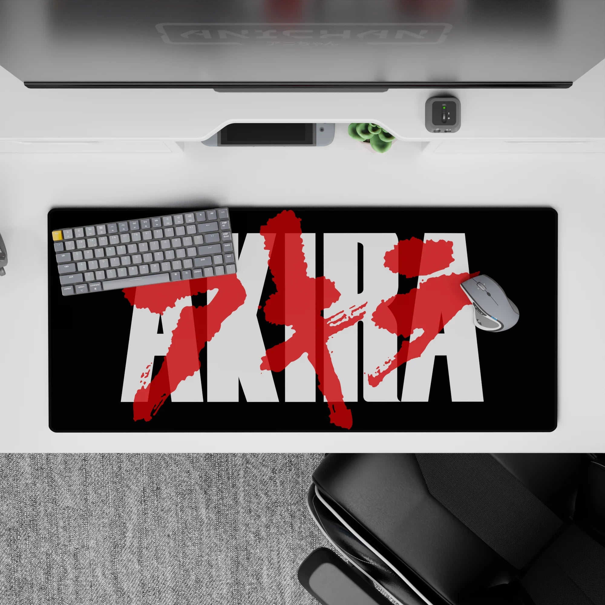 36x16 inches cyberpunk anime desk pad in deep black with stark white type and raw crimson paint streaks.