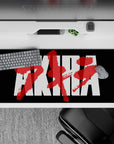36x16 inches cyberpunk anime desk pad in deep black with stark white type and raw crimson paint streaks.