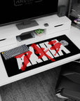 36x16 inches Akira anime desk pad featuring iconic typography and slashing red kanji like neon rain smears.