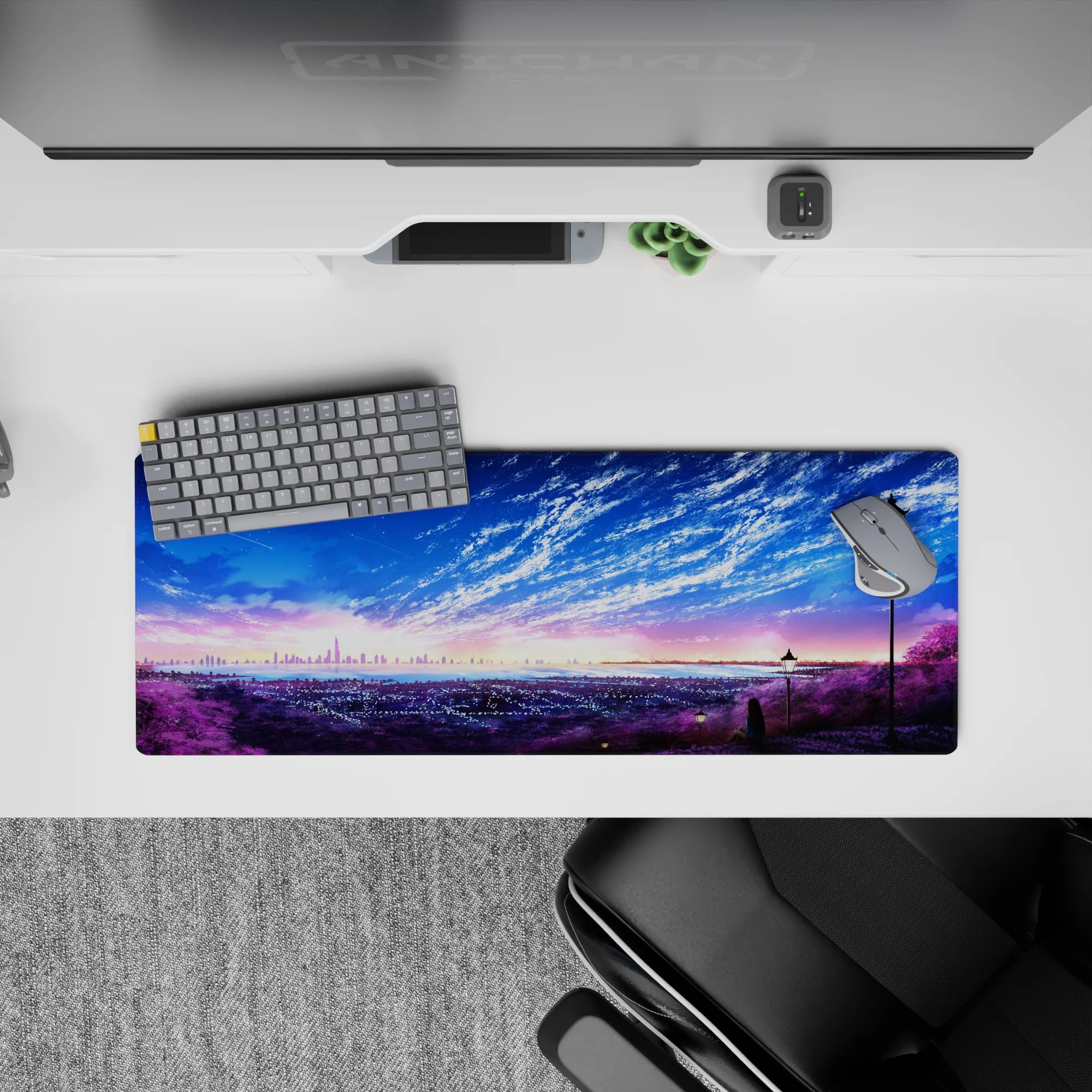 32x12 inches anime desk mat in cotton-candy sunrise and deep ocean blues, calm dreamy sky and clouds.