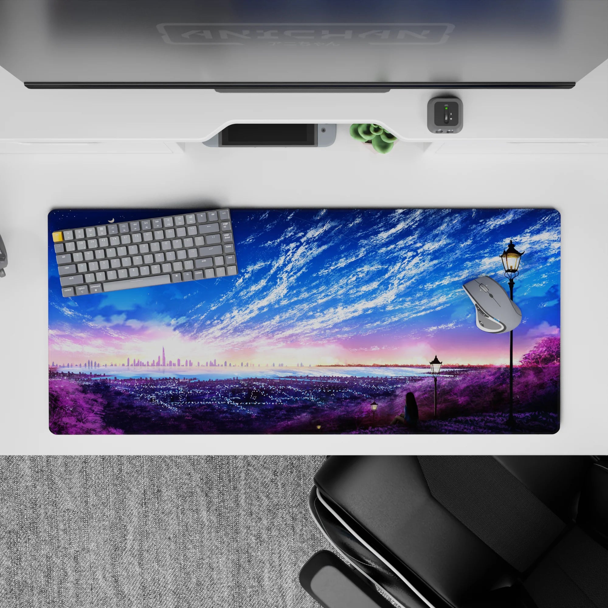 36x16 inches anime desk pad in cotton-candy sunrise and deep ocean blues, calm dreamy sky and moon.