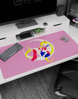 40x20 inches Sailor Moon desk pad showing her lounging on a crescent moon, ribbons hair and bow.