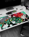 Futaba Sakura from Persona 5 mid-pounce and grinning on oversized desk pad, 40x20 inches.