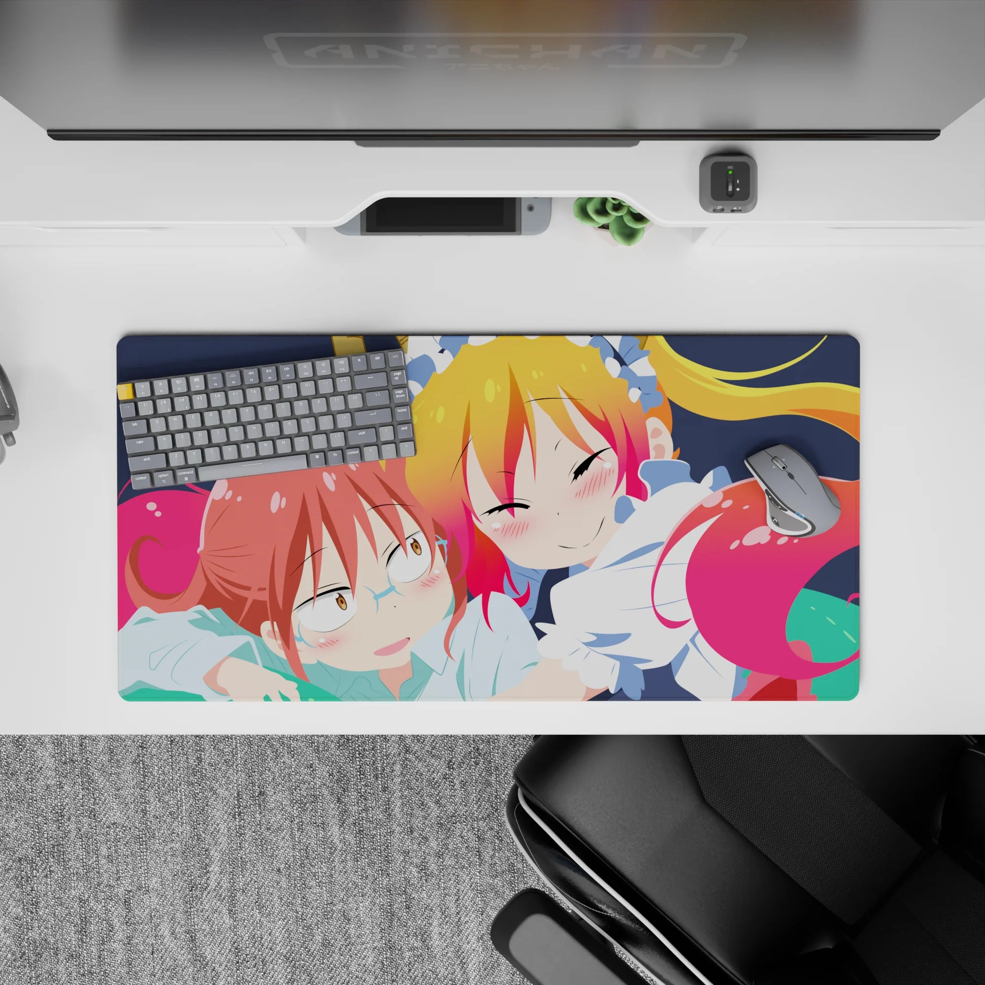 Pink and yellow cozy anime girl mouse pad 32x16 inches on deep navy backdrop, cute mischievous vibe.
