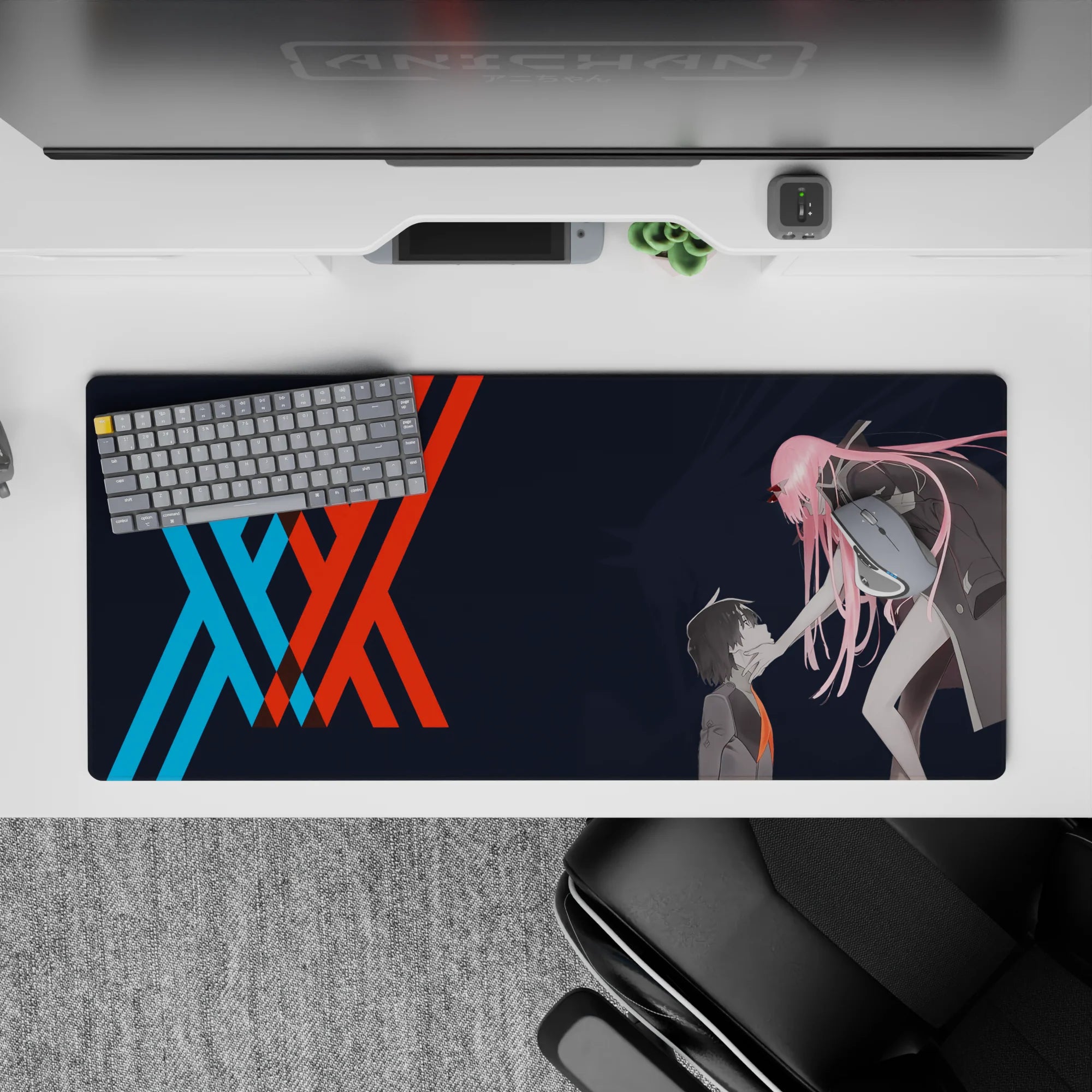 Striking 36x16 desk pad highlights Hiro and Zero Two's bond with bold lines and meaningful artistry