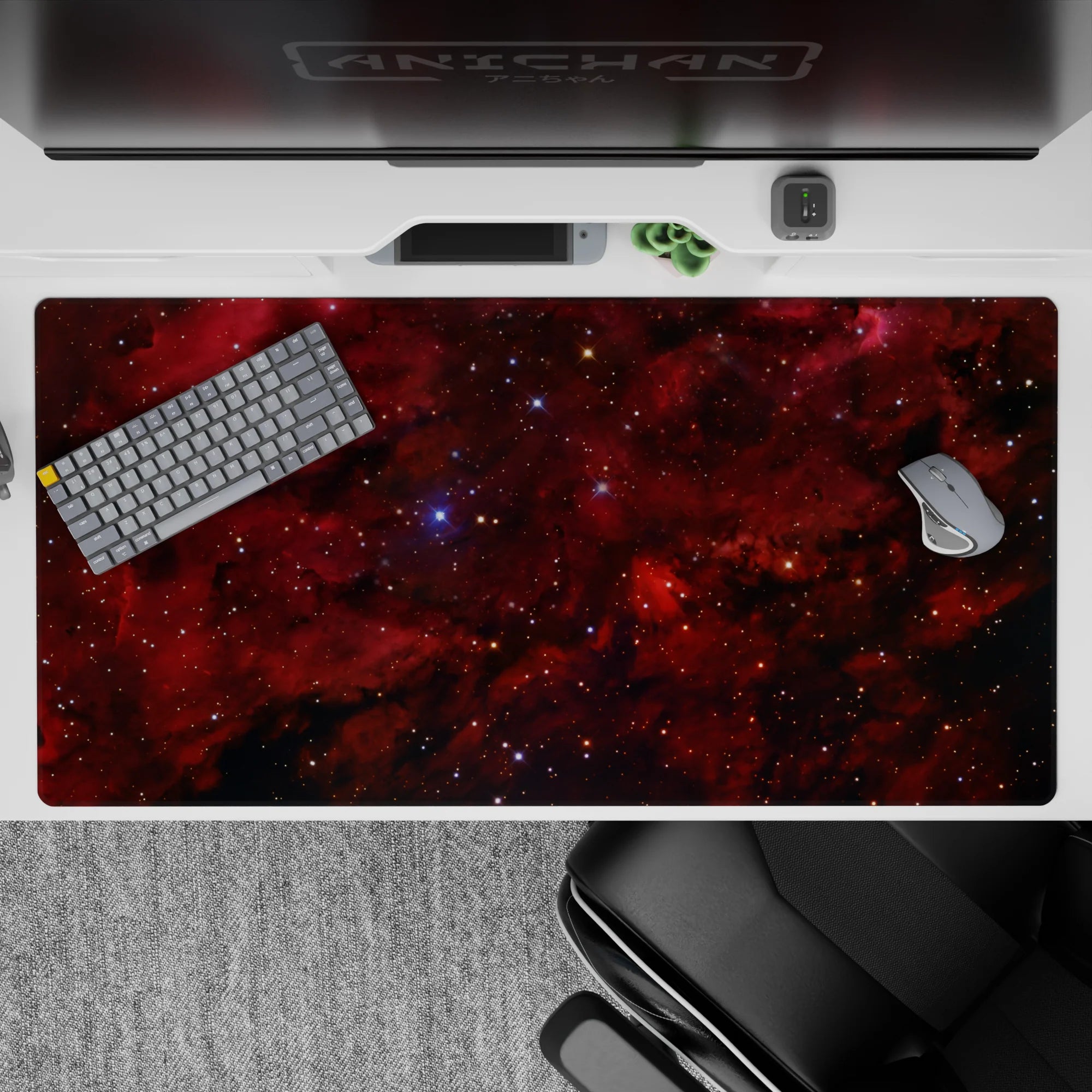 Moody dark red and near-black desk pad, 40x20 inches, calm and cozy space vibe with bright specks.