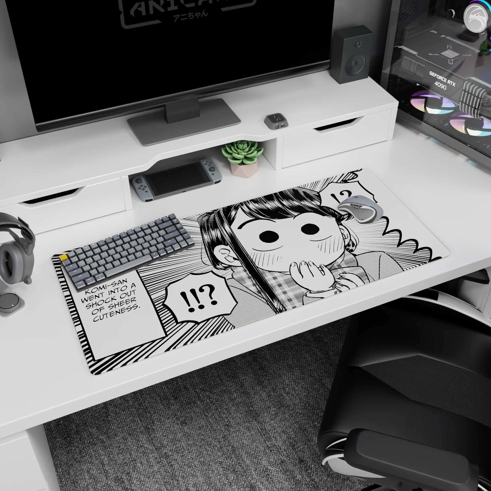 36x16 inches Komi Can’t Communicate desk pad featuring Shouko Komi wide-eyed, hand-to-mouth gasp pose.