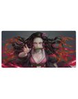Mouse pad 32x16 inches featuring Nezuko from Demon Slayer, with fierce pink eyes and fiery red background, perfect for desks.