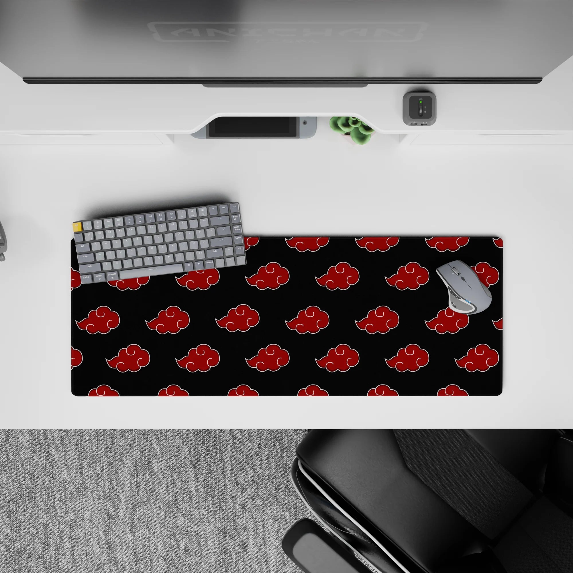 Charcoal black 32x12 inches anime desk mat with crisp red Akatsuki clouds, bold moody Naruto vibe.