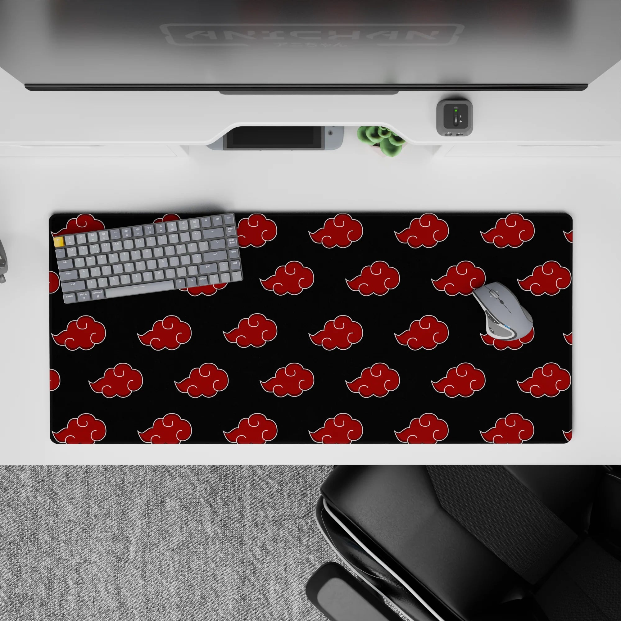 Deep charcoal black anime desk pad 36x16 inches with crisp red cloud emblems, bold moody setup.