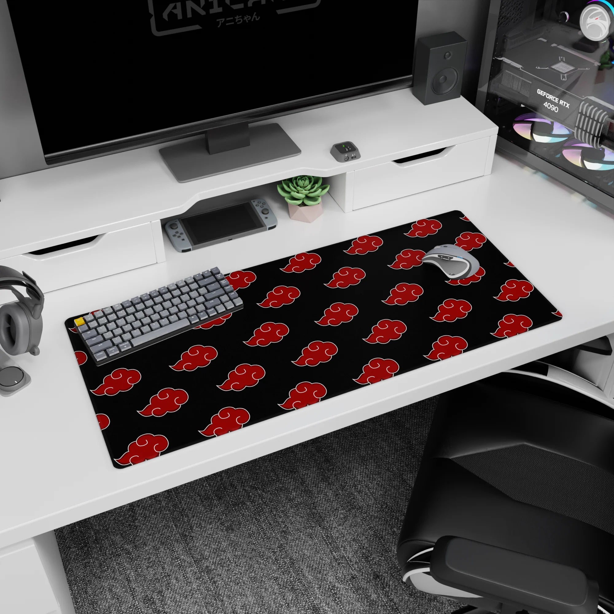 Naruto Shippuden Akatsuki symbols desk pad 36x16 inches, repeating red clouds on black.