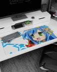 Konata Izumi Lucky Star desk pad 36x16 inches, cheeky victory pose with blue hair, green eyes, blushy grin.