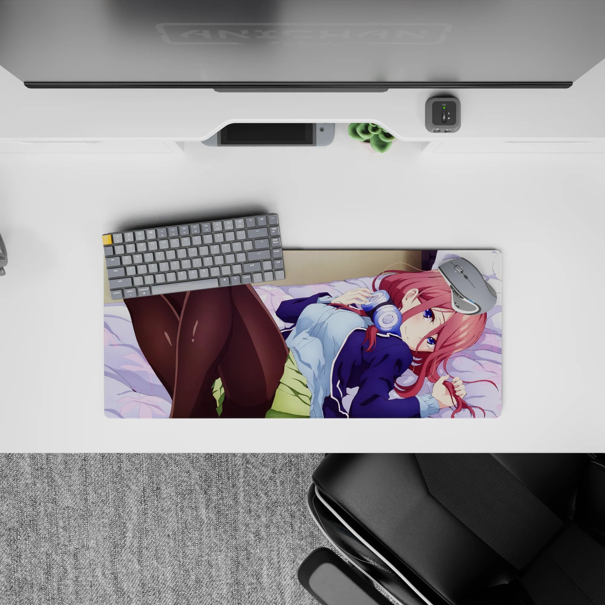 Cozy late-night vibe anime mouse pad 28x12 inches in pink hair, navy jacket, lavender sheets.