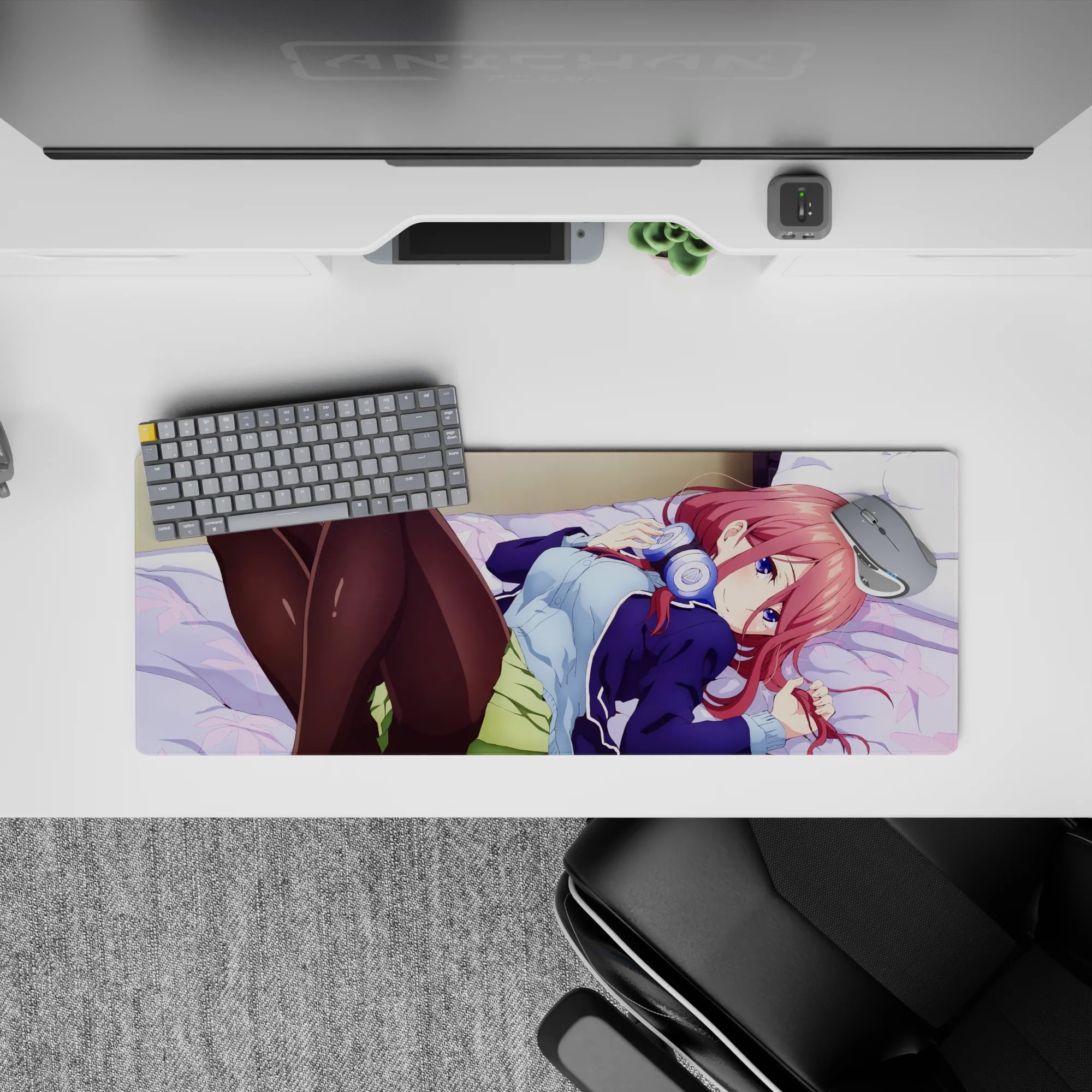32x12 inches desk mat in warm pink, navy, and lavender for cozy late-night playlist vibes.