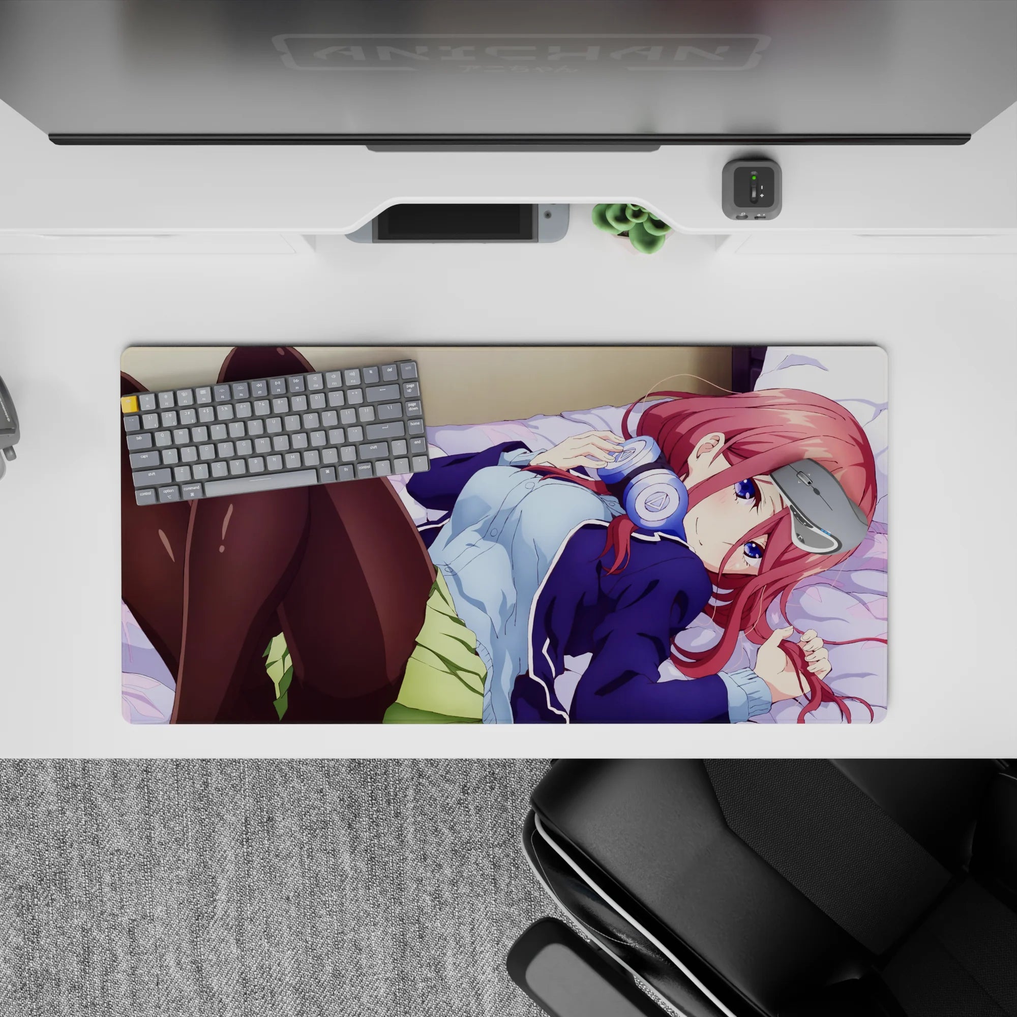 32x16 inches anime mouse pad in warm pink, navy, and lavender for cozy late-night playlist vibes.
