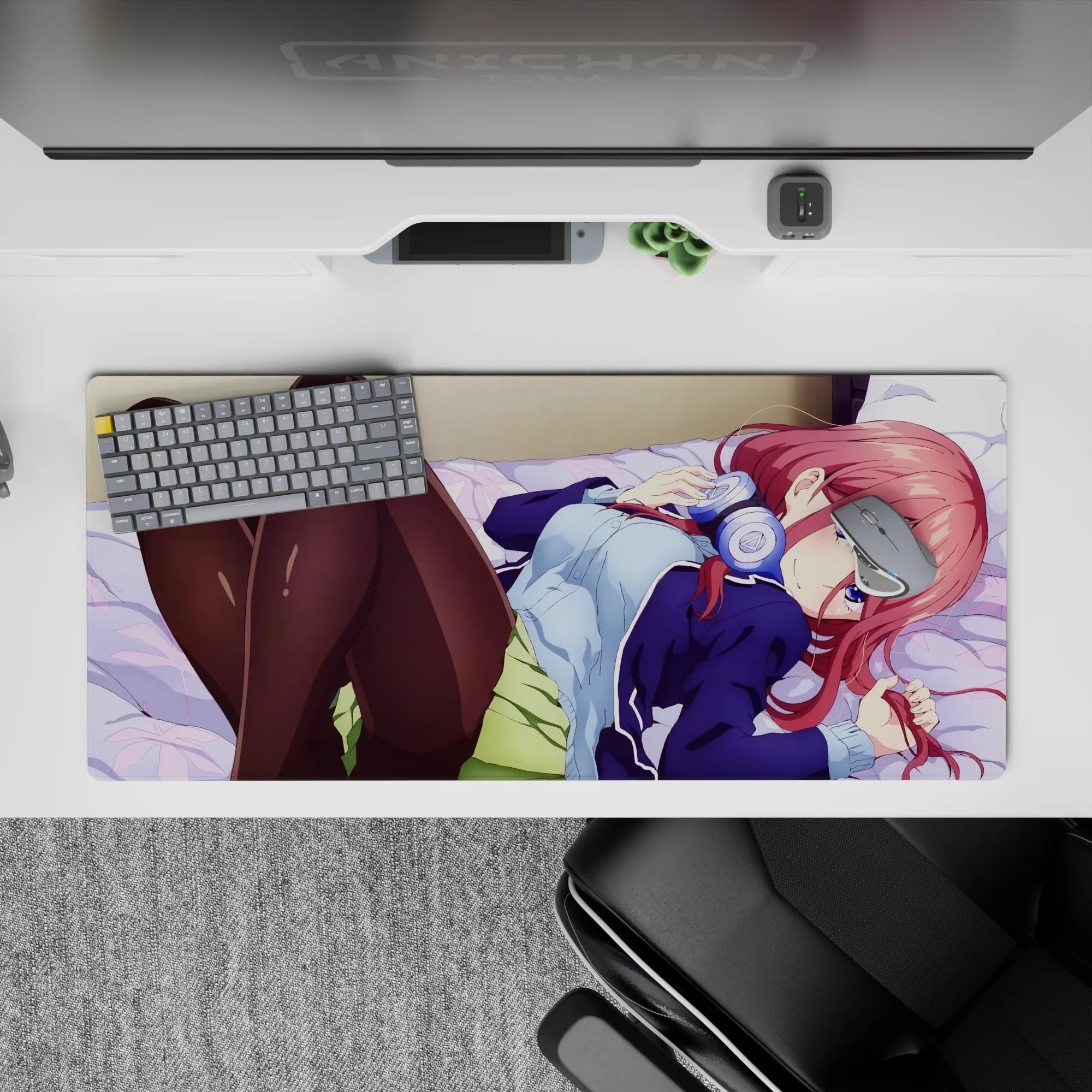 Cozy late-night vibe desk pad 36x16 inches in pink, lavender, and navy with glossy black tights.