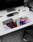32x12 inches anime girl mouse pad showing a redhead lounging on pale sheets, glossy black tights.