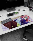 Red-haired anime girl lounging on lavender bedding with headphones and a navy jacket desk pad 36x16 inches.