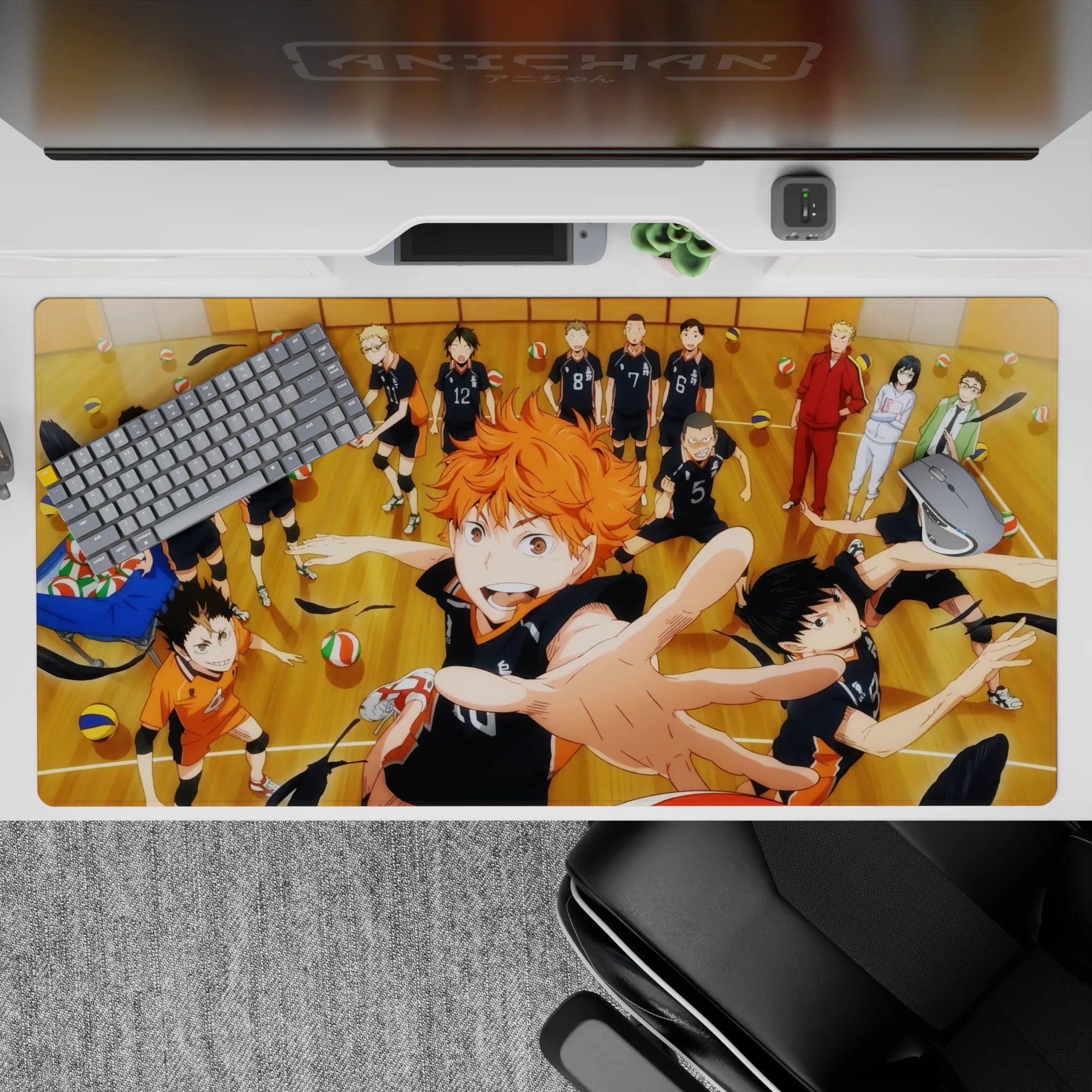 Vibrant 40x20 inches anime desk pad, warm wood tones, black uniforms, orange hair, loud team-spirit energy.