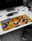 Hinata leaping forward with orange hair and outstretched hand on a 36x16 inches Haikyuu!! desk pad.