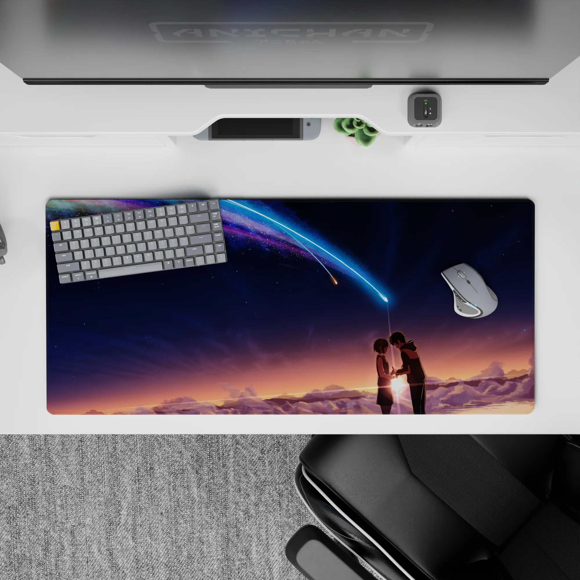 36x16 inches anime desk pad in sunset-to-midnight hues with neon blue-violet comet, dreamy romance vibe.